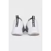 White sneakers with accent decor