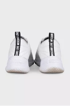 White sneakers with accent decor