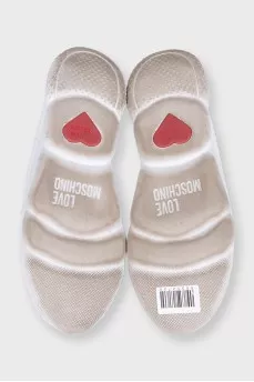 White sneakers with accent decor