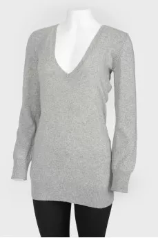 Gray cashmere sweater with a deep neckline