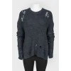Dark blue knitted sweater of a free cut