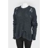 Dark blue knitted sweater of a free cut