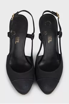 Black slingbacks with gold heels