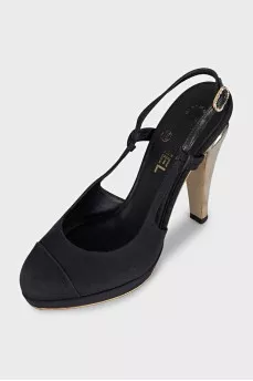 Black slingbacks with gold heels