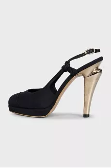 Black slingbacks with gold heels