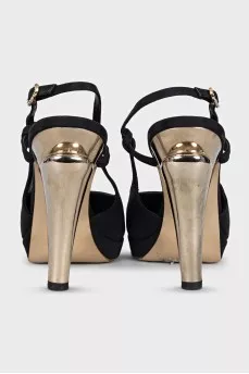 Black slingbacks with gold heels