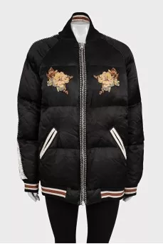 Insulated bomber jacket decorated with embroidery