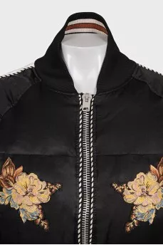 Insulated bomber jacket decorated with embroidery