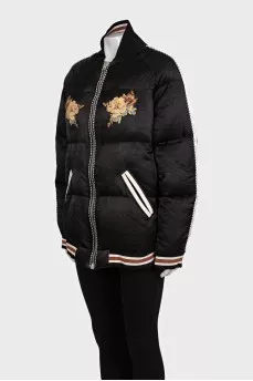 Insulated bomber jacket decorated with embroidery