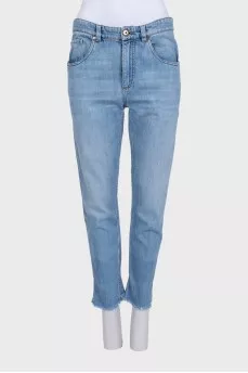 Tapered jeans with raw hem