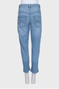 Tapered jeans with raw hem