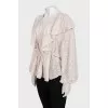 Loose-fitting ruffle blouse with tag