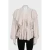 Loose-fitting ruffle blouse with tag