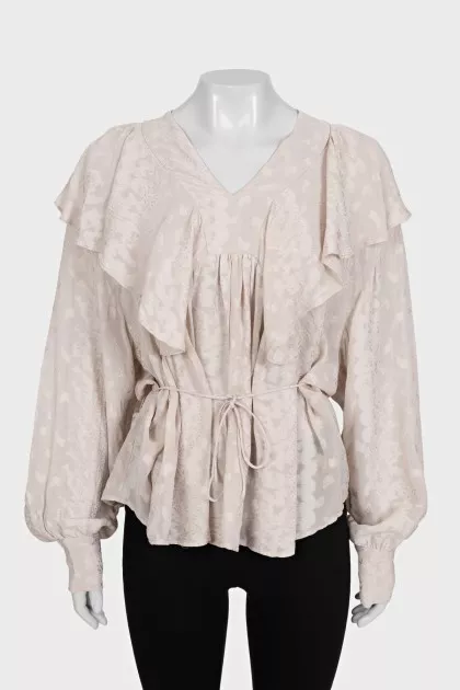 Loose-fitting ruffle blouse with tag