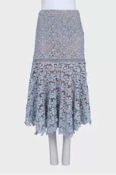 Lace skirt with an asymmetrical hem