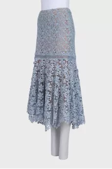 Lace skirt with an asymmetrical hem