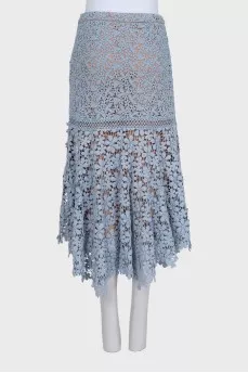 Lace skirt with an asymmetrical hem