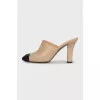 Beige mules with black toe