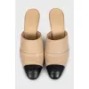 Beige mules with black toe