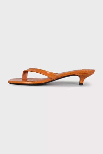 Orange embossed heeled flip flops