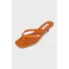 Orange embossed heeled flip flops