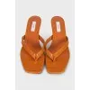 Orange embossed heeled flip flops