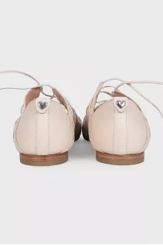 Leather lace-up shoes with tag