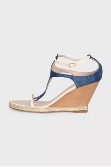 Textile sandals with leather straps on a wedge heel