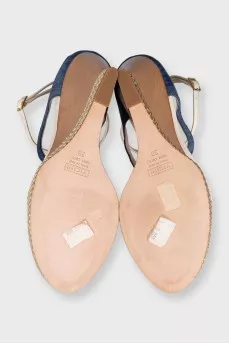 Textile sandals with leather straps on a wedge heel