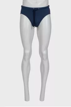 Men's blue swimming trunks with tag