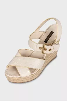 Leather wedge sandals with signature embossing