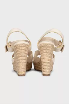 Leather wedge sandals with signature embossing