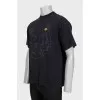 Men's black T-shirt with a signature print
