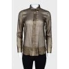 Semi-transparent golden blouse with tag