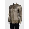 Semi-transparent golden blouse with tag
