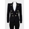 Black jacket with golden buttons with tag