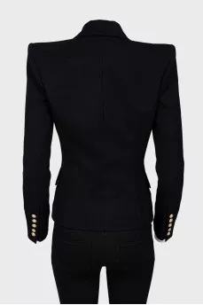 Black jacket with golden buttons with tag