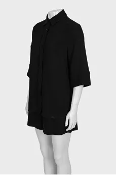 Black suit with loose-fitting shorts