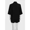 Black suit with loose-fitting shorts