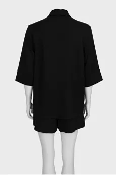 Black suit with loose-fitting shorts