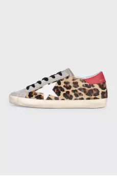Leather sneakers with animal print