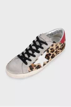 Leather sneakers with animal print