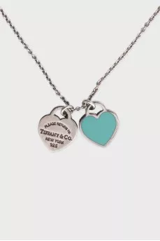 Silver pendant in the shape of two hearts
