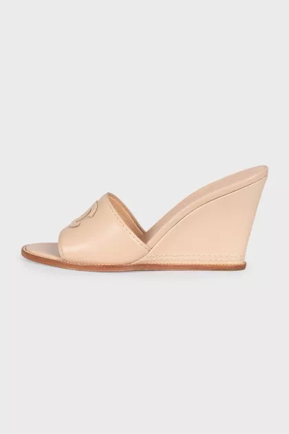 Beige leather logo wedge mules