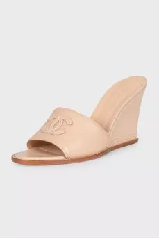 Beige leather logo wedge mules