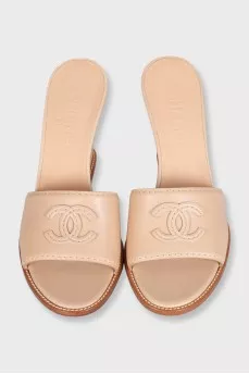 Beige leather logo wedge mules