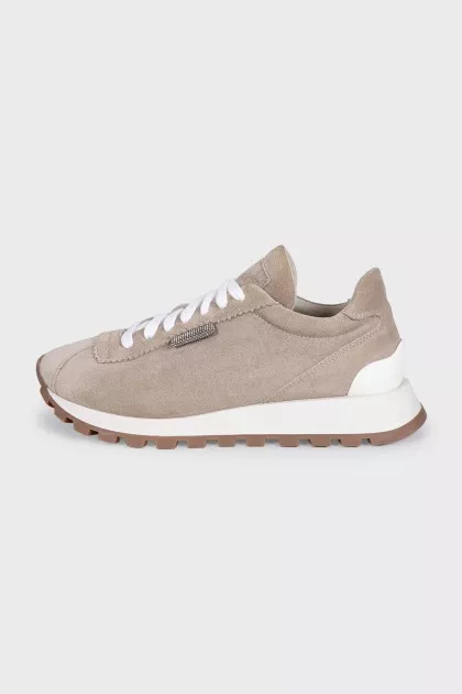 Suede sneakers with branded decor