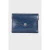 Blue purse of texture leather