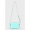 Turquoise bag with application