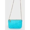 Blue leather bag with gold chain